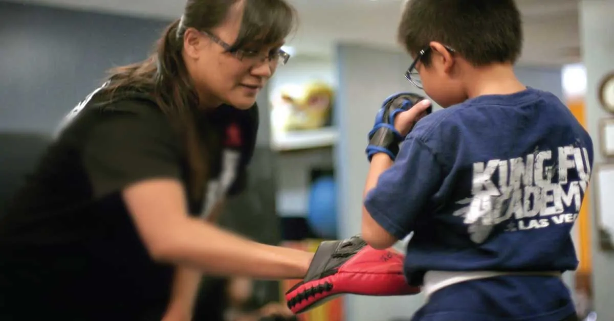 Renee Teaching a Knee Strike